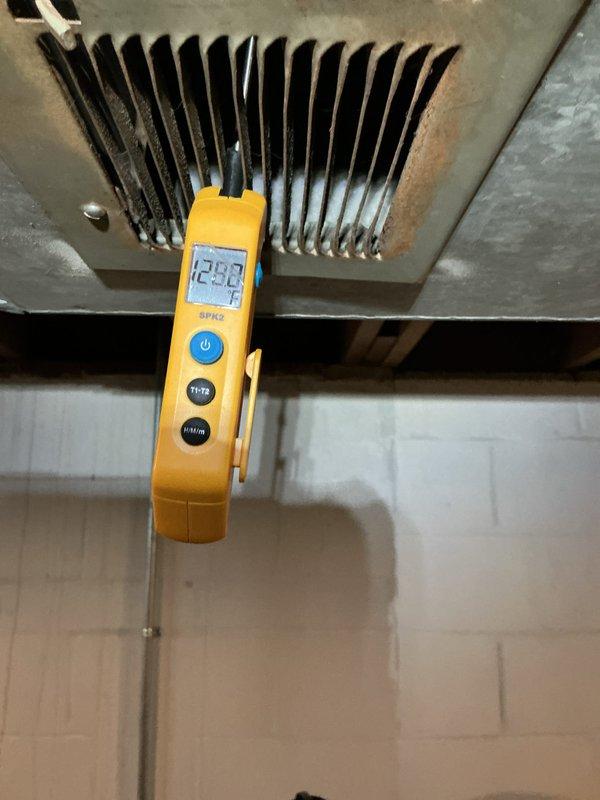Completed maintenance value package furnace tune-up on basement unit in under 10 minutes. Performed system diagnostics and temperature measurements using digital instrumentation, recording supply air temperature of 403°F and return air temperature of 23.2°F, confirming proper heat exchanger operation and temperature rise within manufacturer specifications. Inspected heat exchanger coils, verified all components operating normally, and documented system performance with photographic evidence.