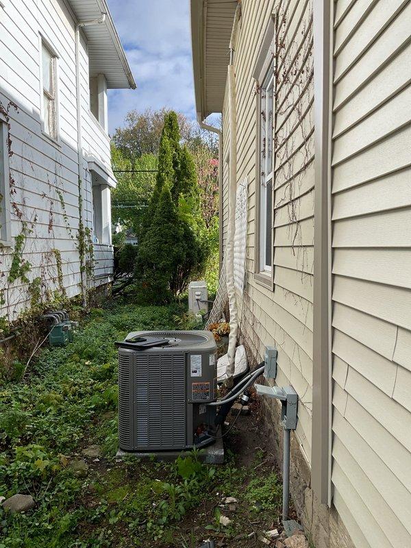 Completed on-site evaluation for mini split installation to serve upstairs bedroom. Assessed existing outdoor condenser placement in side yard and verified available electrical capacity at main panel. Documented refrigerant line routing path from exterior unit through wall penetration and confirmed adequate space for indoor air handler installation in designated bedroom area.
