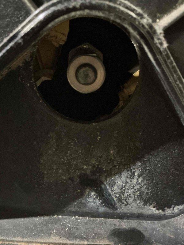 Responded to no heat call where homeowner suspected failed inducer motor. Upon inspection, discovered severely deteriorated and cracked pressure switch assembly with significant corrosion and mineral deposits throughout the combustion chamber area. The pressure switch diaphragm had failed, preventing the furnace from completing its ignition sequence. Replaced faulty pressure switch, cleaned combustion chamber deposits, and verified proper system operation through multiple heating cycles. Unit restored to full functionality with normal heat output confirmed.