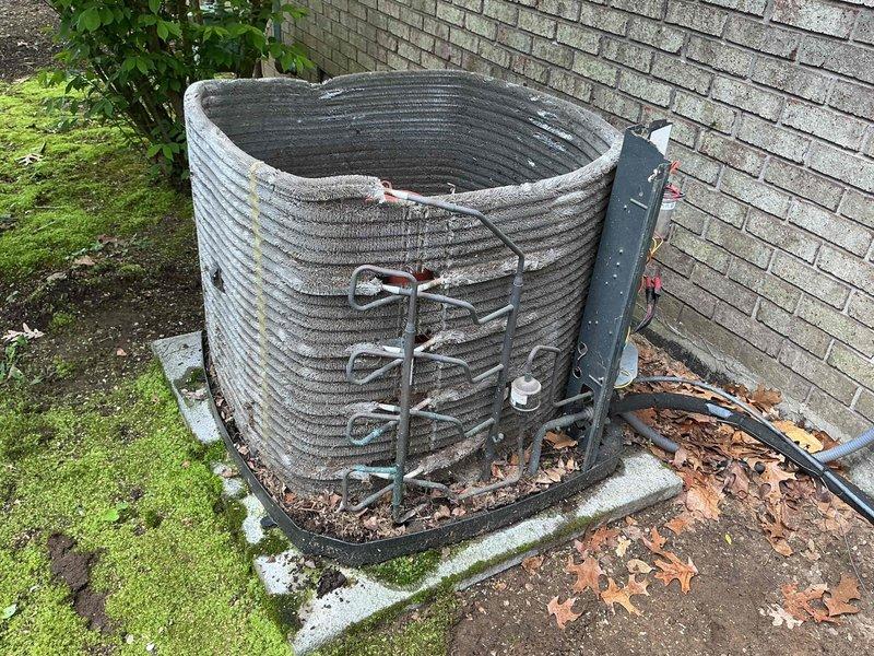 Completed complimentary AC maintenance service on residential cooling system. Inspected outdoor condenser unit with cylindrical configuration and indoor evaporator coil assembly, verified proper operation of all components, and documented system condition with photographs. Unit operational with no deficiencies noted at time of service.