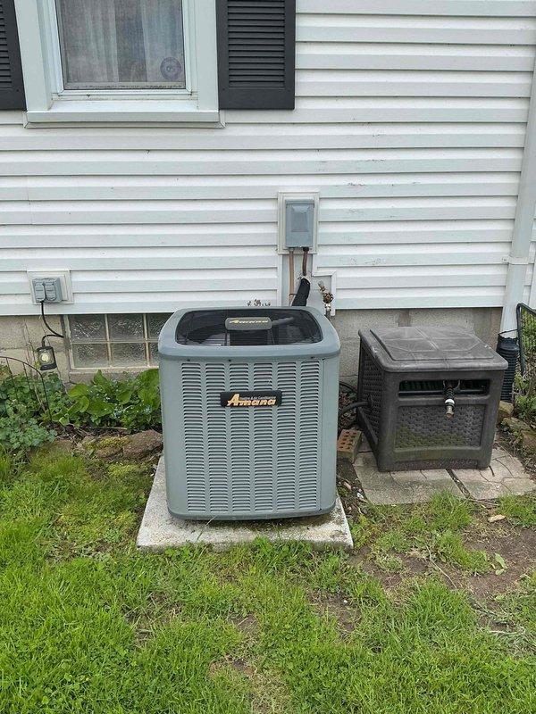 Completed routine air conditioning tune-up on 5-year-old Amana outdoor condensing unit. Performed standard maintenance inspection including checking refrigerant levels, cleaning condenser coils, testing electrical connections, and verifying proper system operation. Unit found to be in good working condition with no immediate repairs needed.