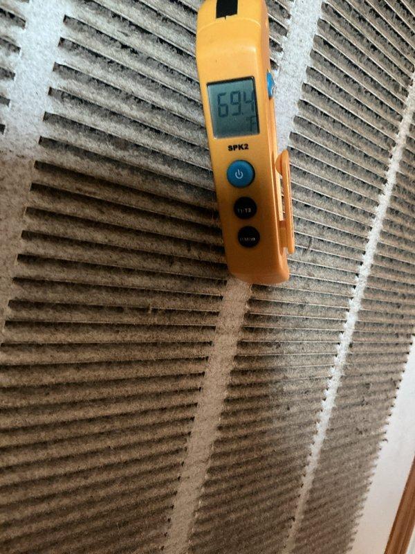 Completed preventative maintenance on a 2-year-old air conditioning system under manufacturer's warranty plan. Performed comprehensive system inspection including interior component examination, electrical connection verification, and airflow assessment. Measured static pressure at 694 CFM to evaluate system performance. Inspected air filtration system, noting dust accumulation on pleated media filters requiring monitoring for future replacement.