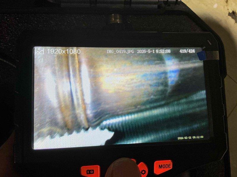 Completed scheduled cooling maintenance visit on HVAC system. Performed comprehensive inspection of heat pump unit, including examination of evaporator coil assembly with copper refrigerant tubes and aluminum fins. Utilized inspection camera to assess interior ductwork condition, verifying flexible ducting integrity. System components inspected, unit operational. Photos documented for service records.