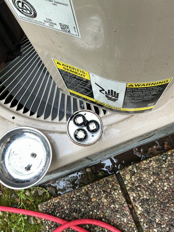 Performed comprehensive air conditioning tune-up on outdoor condensing unit located beneath deck lattice structure. Completed full system inspection including electrical connections, refrigerant levels, condenser coil cleaning, and operational testing to ensure optimal cooling performance for the upcoming season.
