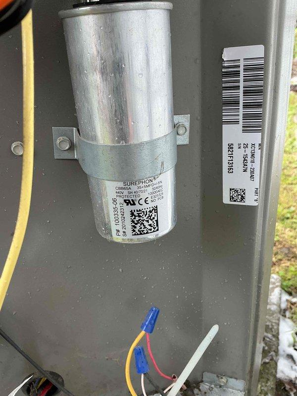 Completed comprehensive air conditioning tune-up including inspection of electrical disconnect box, verification of cartridge fuses and wiring connections, and capacitor testing. Customer was advised that furnace filter requires replacement at this time.