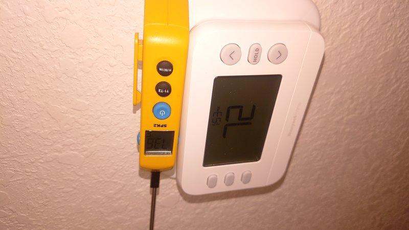 Responded to third service call for non-functional thermostat following new HVAC system installation. Verified all terminal connections at thermostat base including W2, O/B, C, G, W, Y, and ACC wiring points. Performed diagnostic testing with digital multimeter to confirm thermostat malfunction and replaced defective unit to restore heating operation.