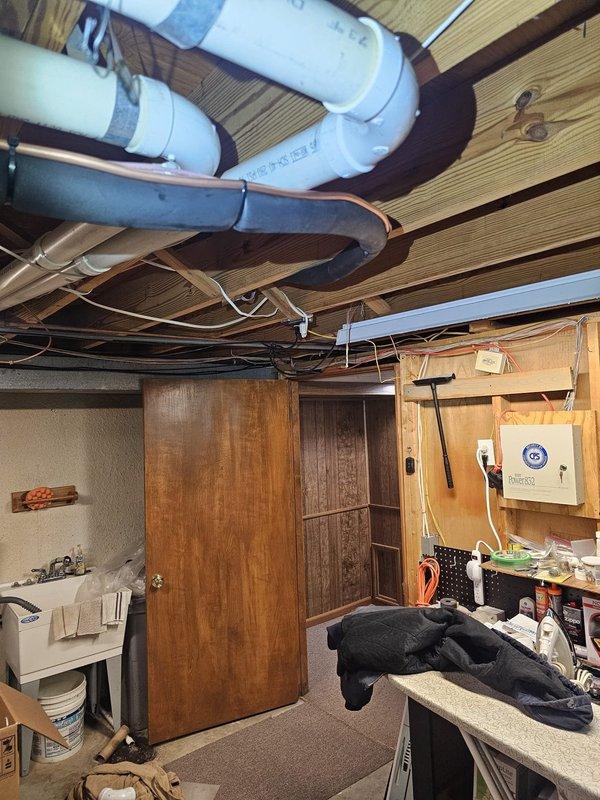 Completed installation of 13 SEER 2.5 ton air conditioning package unit with upflow cased coil. Installed new 3/4" x 25' refrigerant line set, concrete equipment pad, electrical disconnect with whip, and Honeywell thermostat to provide complete cooling system functionality.