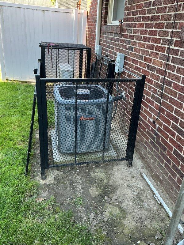 Completed routine maintenance on 7-year-old Amana central air conditioning system and inspected mini-split unit. Performed standard cooling season service including filter inspection, temperature differential measurements, and system performance verification. Supply air temperature measured at 45.9°F, indicating proper cooling operation. Outdoor condenser unit secured within protective cage enclosure, all components accessible and functioning normally. Both systems operational upon completion.