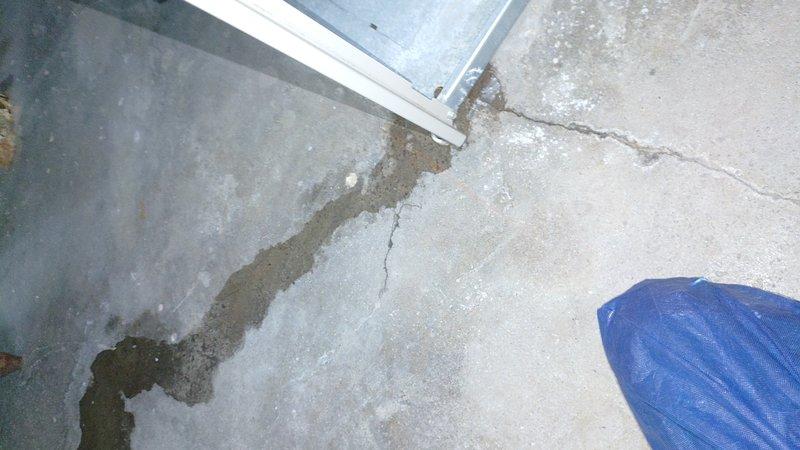 Responded to service call for furnace leaking water. Upon inspection, identified failed condensate pump allowing water to overflow and discharge onto concrete floor, causing visible water damage and staining. Replaced malfunctioning condensate pump with new unit, tested drainage system for proper operation, and verified furnace resumed normal heating cycle without further water leakage.