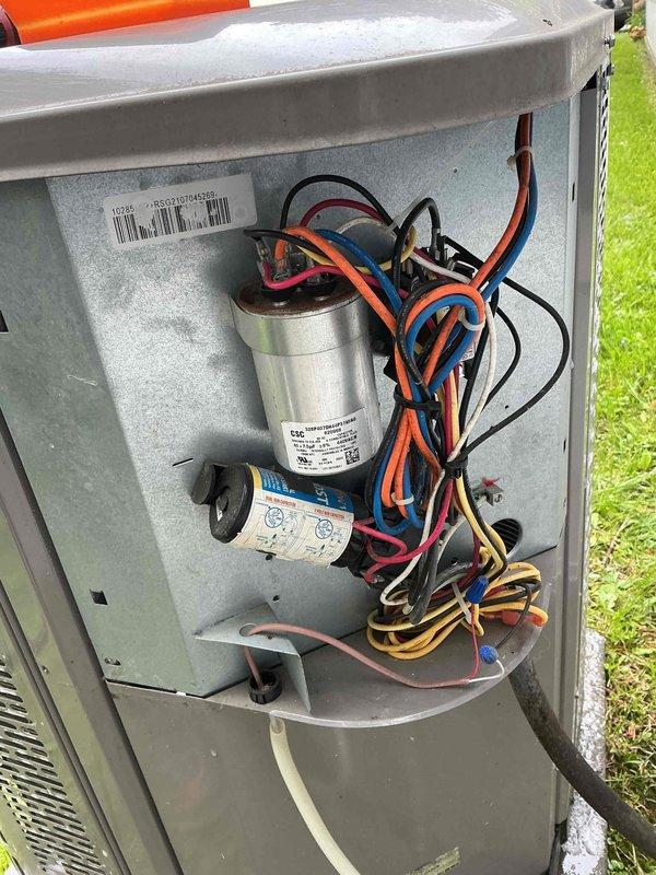 Performed preventative maintenance on residential air conditioning system. Inspected electrical components including capacitor, contactor, and fuse assembly. Verified all electrical connections were secure and functioning properly. System operating within normal parameters upon completion of maintenance visit.