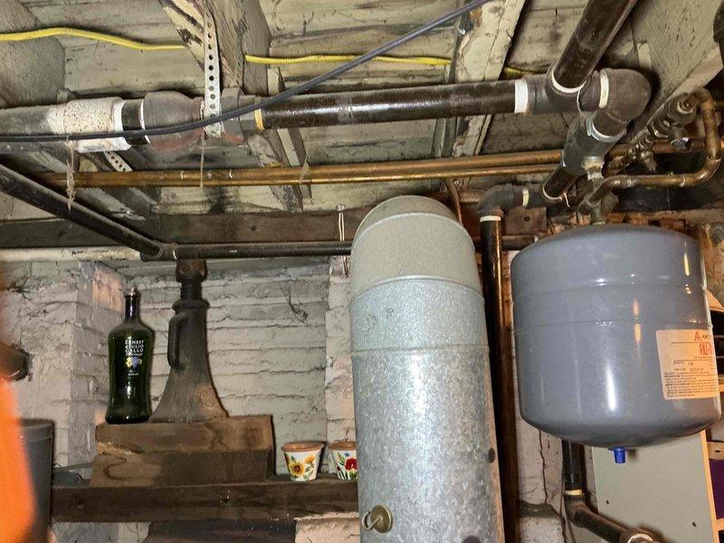 Completed comprehensive tune-up and safety inspection on gas-fired hydronic boiler system. Performed combustion analysis, cleaned and inspected burner assembly, checked all safety controls, tested expansion tank pre-charge, verified proper operation of circulator pumps and zone valves, and inspected all visible piping connections for leaks. Customer was contacted with findings and system performance details prior to processing payment, and all work was approved before completion.
