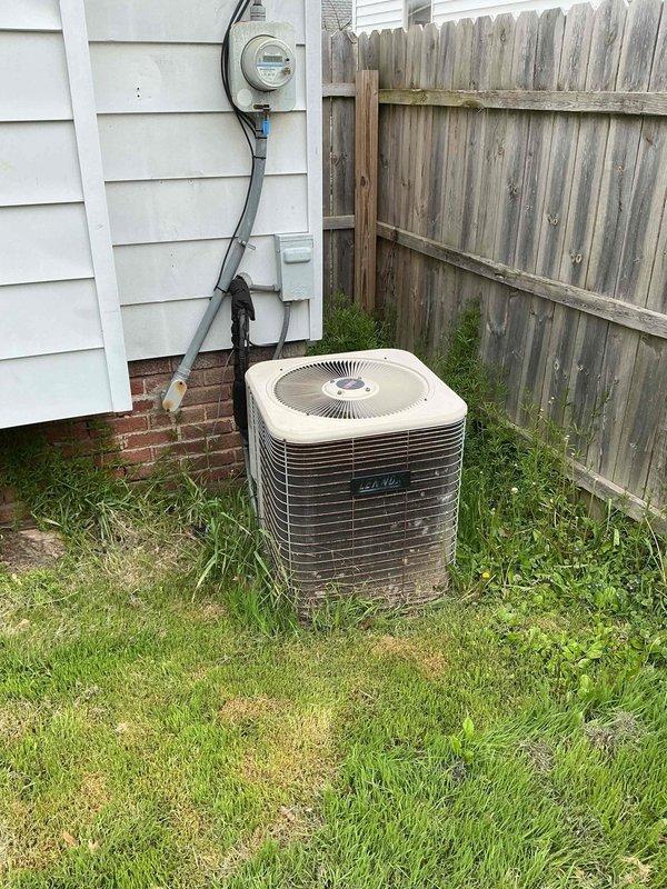 Completed routine air conditioning maintenance on residential outdoor condensing unit. Performed visual inspection of equipment exterior, verified proper placement on pad, and inspected electrical connections at capacitor and control compartment. Unit operational with all electrical components properly connected and secured.