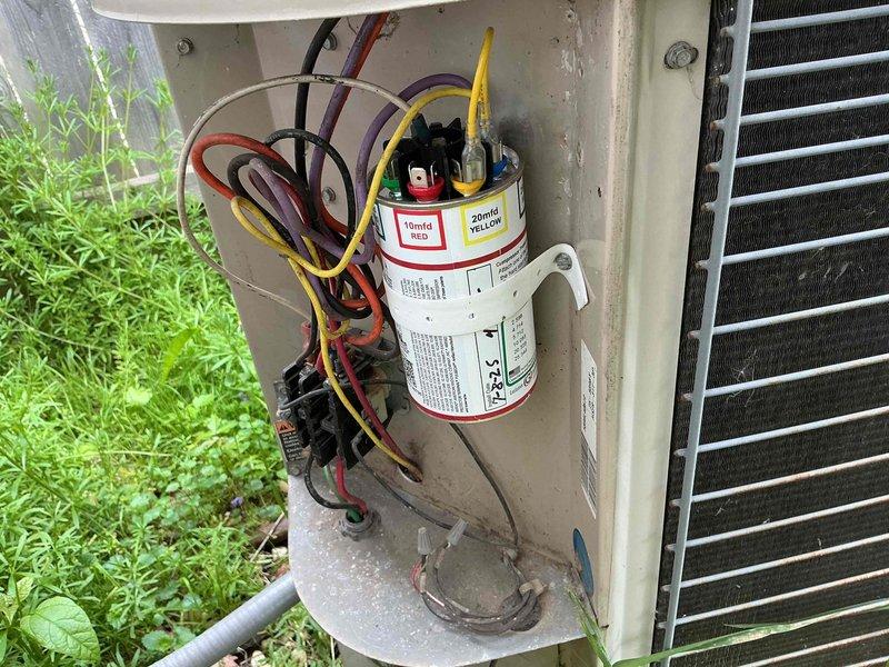 Completed routine air conditioning maintenance on residential outdoor condensing unit. Performed visual inspection of equipment exterior, verified proper placement on pad, and inspected electrical connections at capacitor and control compartment. Unit operational with all electrical components properly connected and secured.