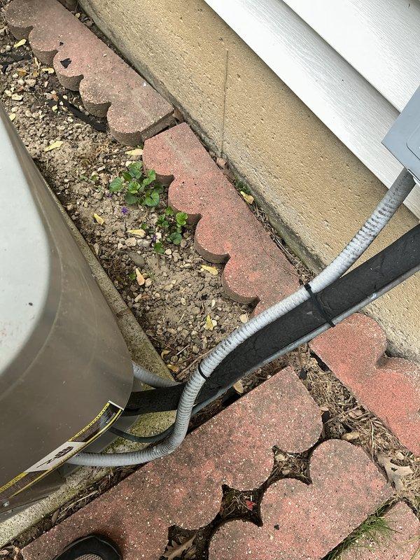 Completed routine cooling maintenance on a 19-year-old air conditioning system. Performed comprehensive inspection of outdoor condensing unit, including examination of electrical components, dual run capacitor, contactor, and refrigerant line connections. All wiring bundles, terminals, and electrical connections were inspected and found to be secure and functioning properly despite the unit's age and normal environmental wear.
