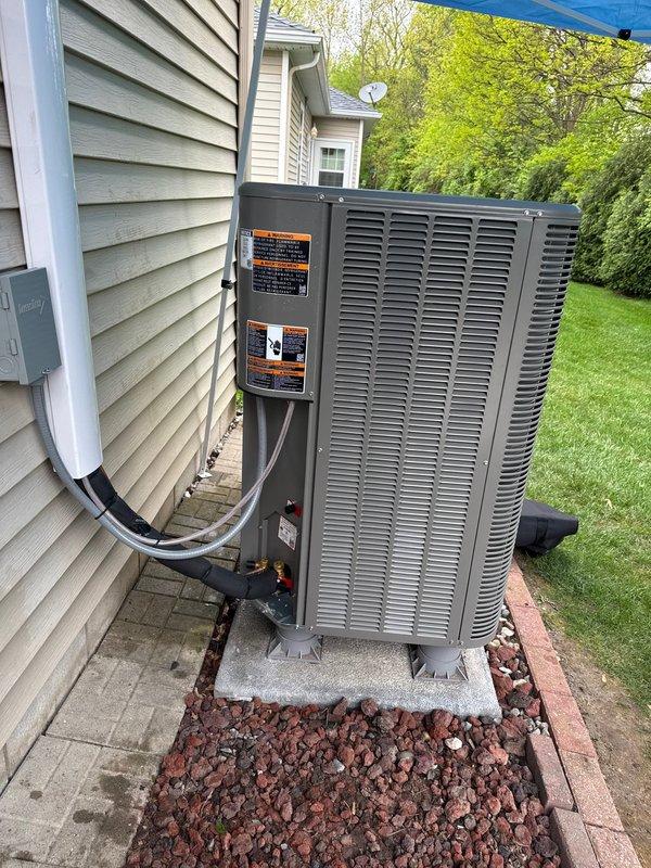 Replaced existing outdoor heat pump unit with warehouse unit, utilizing refrigerant pull-back method to avoid recovery. Installed sealing around furnace and line set penetration per city inspector requirements. Tested system operation and verified proper function of all equipment components.