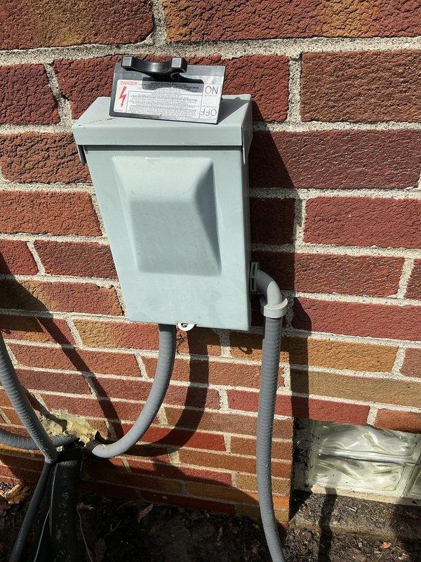 Completed preventative maintenance on 12-year-old air conditioning system. Inspected condenser fan assembly, electrical disconnect, and associated components; cleaned debris from outdoor unit and verified proper electrical connections at capacitor and disconnect box.