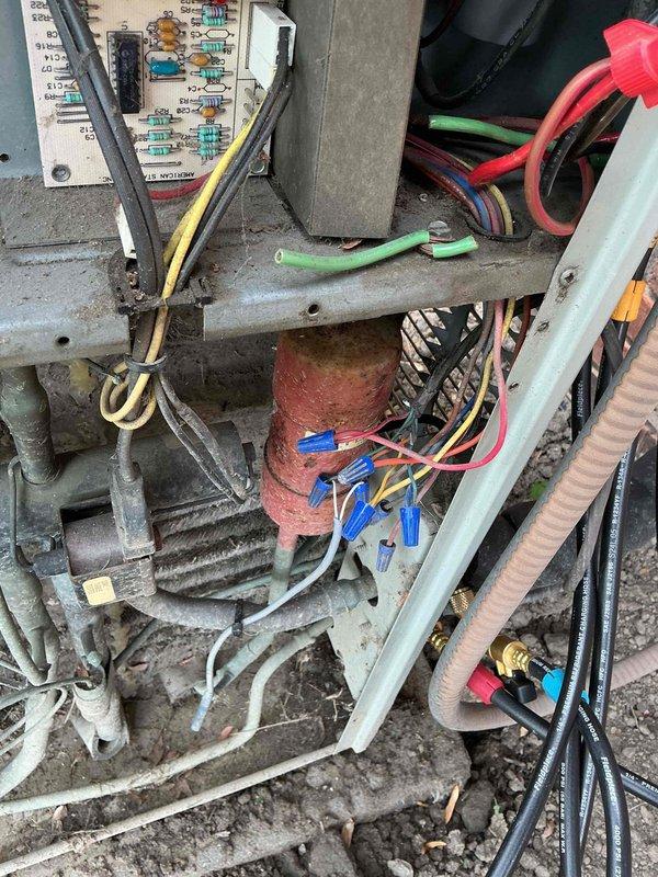 Reconnected air conditioning system that had been previously disconnected by another contractor for excavation work. Performed system startup, evacuated refrigerant lines, and recharged unit to manufacturer specifications using manifold gauges to verify proper pressures. System tested and confirmed operational with normal cooling performance restored.
