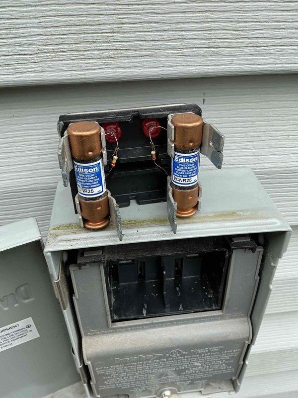 Completed scheduled maintenance on 6-year-old air conditioning system per customer's after 4pm availability request. Performed comprehensive inspection of outdoor unit including electrical disconnect box, verified proper fuse operation and connections, confirmed all safety switches functioning correctly, and documented equipment condition with service photos. All components found operating within normal parameters with no immediate repairs required.