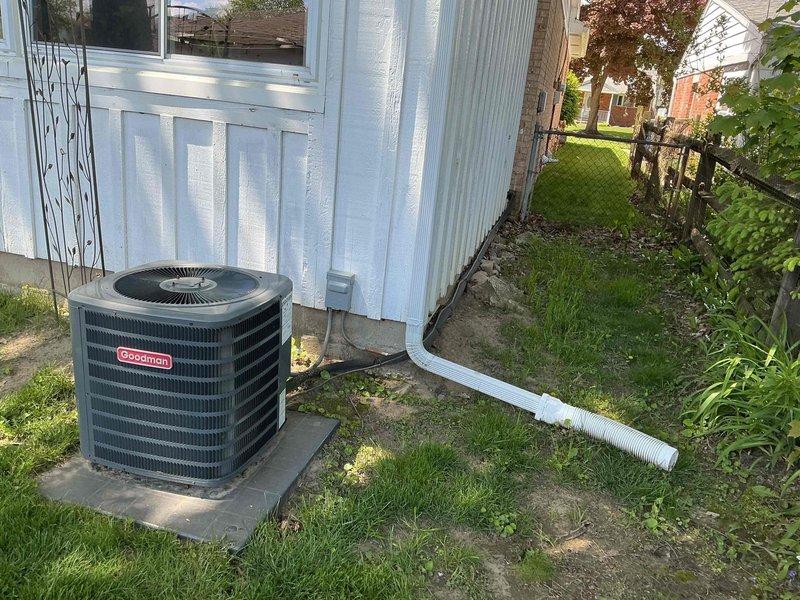 # HVAC Maintenance Service Completed

Performed routine maintenance on a 6-year-old Goodman air conditioning unit. Accessed electrical compartment to inspect capacitor, contactor, and wiring connections; verified all components were functioning properly. Checked condensate drainage line routing and confirmed proper system operation.