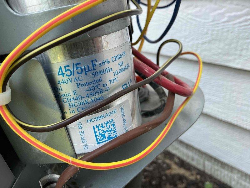 Completed comprehensive AC tune-up on 2-year-old Bryant HVAC system. Performed standard maintenance protocol including inspection of furnace unit, verified proper operation of dual-run capacitor (45/5µF, 440V AC), checked all electrical connections, inspected condensate drainage system with PVC piping, and replaced air filter. All components tested within normal operating parameters with no deficiencies noted.