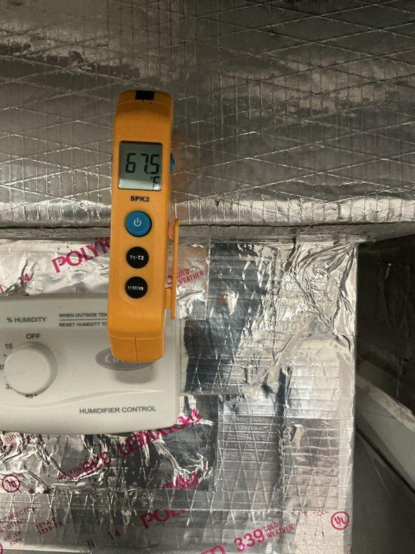 Completed scheduled recurring cooling maintenance on 1.5-year-old HVAC system. Inspected ductwork, humidifier control system, and supply/return vents in basement and attic areas. Verified temperature readings at 67.5°F and confirmed proper operation of humidity control equipment. All components functioning within normal parameters with no issues identified.