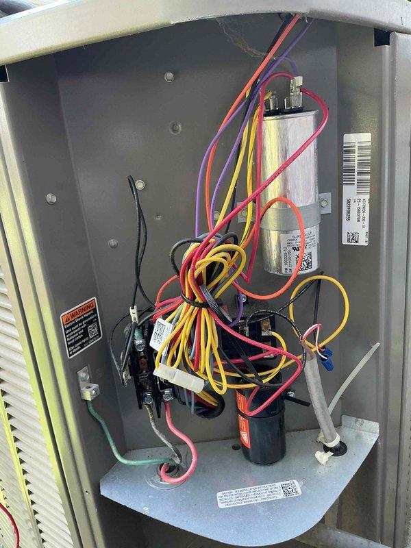 Performed routine cooling maintenance on a 2-year-old residential air conditioning system. Inspected furnace, air handler, and associated ductwork in basement installation; verified proper operation of electrical components including dual capacitors and control wiring; checked refrigerant lines and condensate drain system. All components found operating within normal parameters with no issues identified.