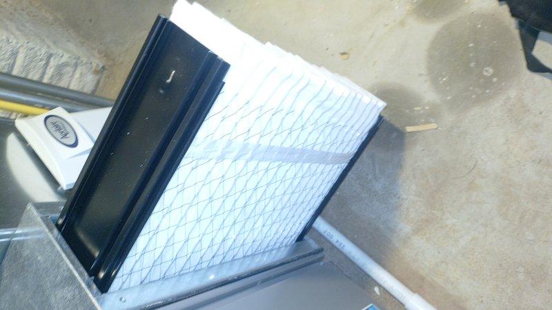 Performed routine cooling maintenance on 19-year-old air conditioning system. Inspected outdoor condenser unit and noted significant dirt and debris accumulation on coil fins. Replaced indoor air filter with new pleated filter to ensure proper airflow and system efficiency. Unit operational and ready for cooling season.