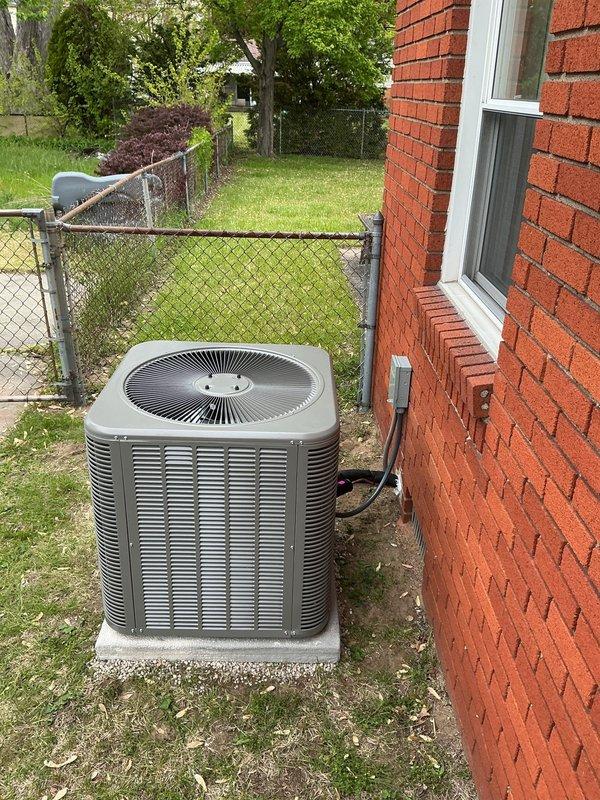 Completed full HVAC system installation in crawl space application, including horizontal configuration 96% efficiency 70,000 BTU gas furnace with matched horizontal cased evaporator coil. Installed drain pan with integrated flood control device for condensate management and safety protection. Ran new 3/4" x 30' refrigerant line set from indoor coil to outdoor single-stage condenser unit, ensuring proper refrigerant circuit connectivity. Set outdoor condenser on new concrete equipment pad with proper leveling and positioning for optimal airflow and drainage. Installed new electrical disconnect switch and whip for code-compliant power supply to outdoor unit. Mounted L-40 programmable thermostat for system control and completed all electrical connections. Secured refrigerant lines to exterior brick wall with appropriate mounting brackets and insulation. Verified all connections, performed system startup, and confirmed proper operation of heating and cooling cycles.