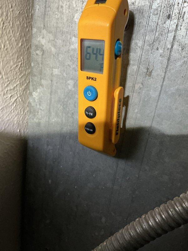 Completed routine air conditioning maintenance visit as part of recurring service agreement. Performed system inspection, checked refrigerant temperatures using digital thermometer showing 64°F reading at evaporator coil, and verified proper operation of condenser unit heat exchanger fins, copper refrigerant lines, capacitor, and electrical connections. All components found in good working condition with system operating within normal parameters.