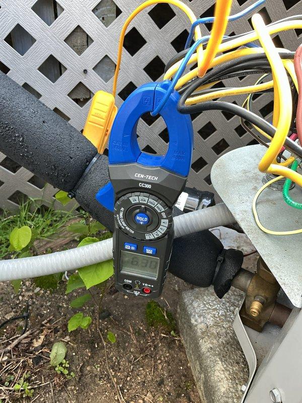 Completed routine air conditioning maintenance on residential cooling system. Performed electrical diagnostics using clamp meter to verify amperage draw and system performance on outdoor condenser unit. Inspected condensate drain line operation and confirmed proper drainage. All components tested within normal operating parameters and system running efficiently.