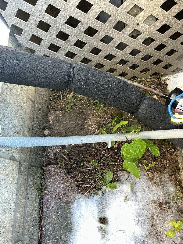 Completed routine air conditioning maintenance on residential cooling system. Performed electrical diagnostics using clamp meter to verify amperage draw and system performance on outdoor condenser unit. Inspected condensate drain line operation and confirmed proper drainage. All components tested within normal operating parameters and system running efficiently.
