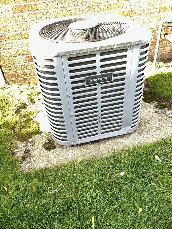 Completed scheduled air conditioning maintenance on Ameristar condensing unit. Performed standard preventive maintenance procedures including inspection of all major components, refrigerant lines, and electrical connections. Unit exhibited significant exterior corrosion and rust deterioration on cabinet panels, particularly along bottom edges and corners, indicating prolonged exposure to moisture and lack of previous exterior maintenance. Despite cosmetic deterioration, unit operational at time of service. Documented equipment condition with photographs for customer records.