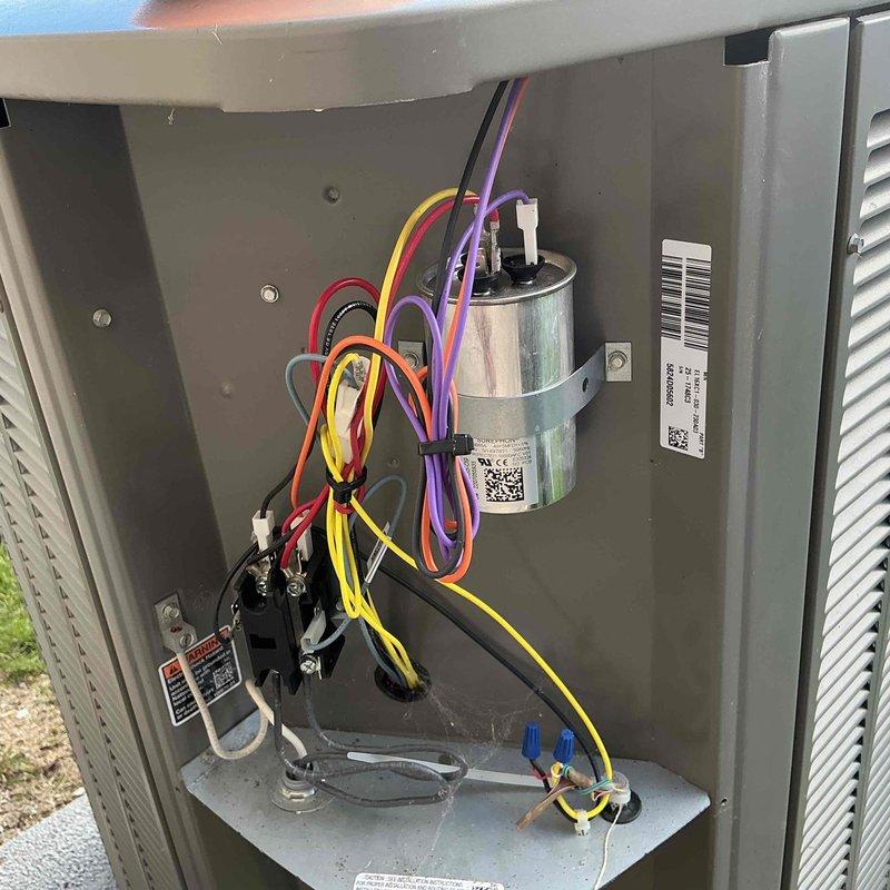 Completed annual cooling maintenance on residential Trane HVAC system per home plan agreement. Performed comprehensive inspection of outdoor condensing unit, verifying proper operation of compressor, condenser fan motor, and electrical components including capacitor and contactor. All electrical connections were secure with no signs of overheating or deterioration. Checked refrigerant pressures and confirmed system is operating within manufacturer specifications. Inspected indoor air handler and furnace unit, verified proper airflow and filter condition. Documented system condition with photos showing clean electrical compartment and properly functioning components. Unit is one year old and operating efficiently with no issues identified requiring immediate attention.