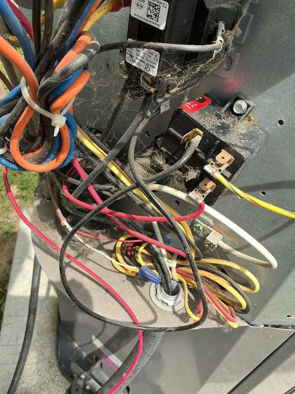Completed scheduled maintenance visit on a 3-year-old air conditioning system under MVP recurring service plan. Performed comprehensive system inspection including airflow measurement at floor register (688 CFM recorded), verified electrical connections and capacitor operation, and inspected all wiring and components within the outdoor unit compartment for proper function and safety compliance.