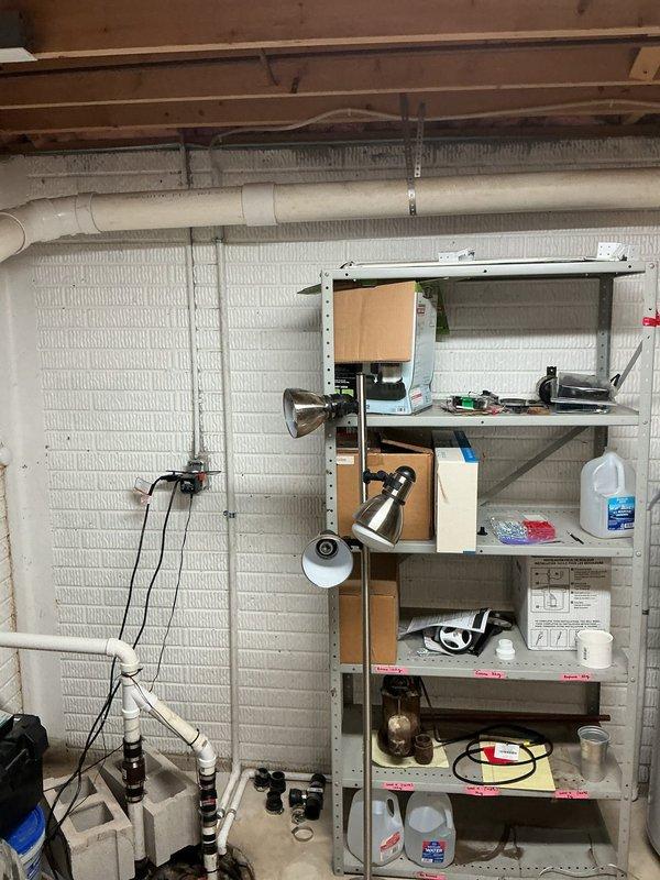 Completed installation of a 96% efficiency, 110,000 BTU furnace in basement mechanical room. Replaced approximately 70 feet of 3-inch venting system with new metal ductwork, routed from furnace through ceiling joists to exterior termination. Installed metal condensate pump with drainage tubing to handle condensation from high-efficiency unit. Reconnected existing thermostat to new furnace control board and verified proper operation. All gas connections, electrical wiring, and safety controls tested and confirmed operational per manufacturer specifications.