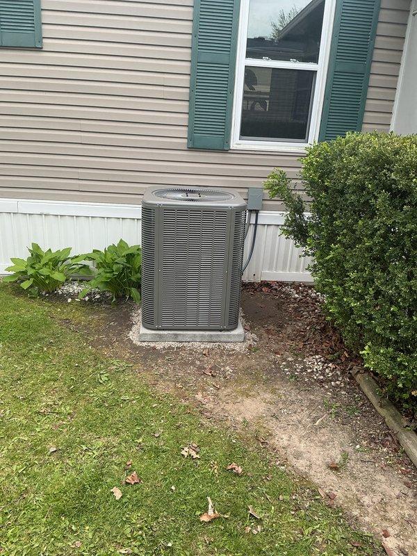 Successfully installed a complete 2-ton, 14 SEER mobile home split gas system featuring a downflow 80% efficiency, 70,000 BTU furnace with integrated coil cabinet. The outdoor condensing unit was positioned on a new equipment pad with proper clearances, connected via a new 3/4-inch by 30-foot refrigerant line set. Installed a new roof jack for furnace exhaust venting to ensure proper combustion air evacuation and code compliance.

Fabricated and installed required sheet metal duct connectors at the supply plenum to integrate the new system with existing ductwork. Established electrical service by installing a new disconnect box and #10 gauge supply whip to the outdoor unit per NEC requirements. Upgraded climate control with a new programmable thermostat, providing enhanced temperature management and energy efficiency capabilities.

All components were pressure-tested for refrigerant leaks, evacuated to proper vacuum levels, and charged to manufacturer specifications. System was fully c