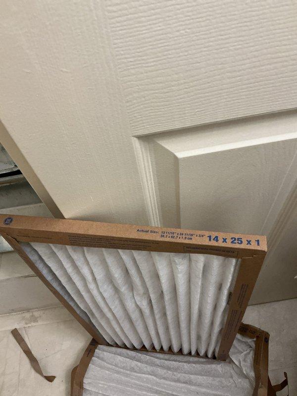 Completed annual maintenance on one-year-old air conditioning system under maintenance plan. Inspected electrical disconnect and fuses at outdoor unit, verified proper operation of all components, and replaced 14x25x1 pleated air filter at return air grille to ensure optimal airflow and system efficiency.