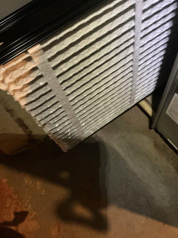 Completed preventive maintenance tune-up on 8-year-old outdoor air conditioning unit. Performed comprehensive system inspection, replaced air filter, and evaluated condenser coil condition. Noted significant deterioration and fin damage along the top edge of condenser coil, which may impact heat transfer efficiency and system performance over time.