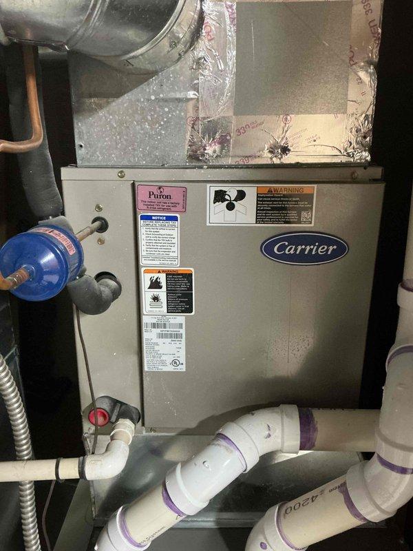 Completed annual air conditioning tune-up and preventative maintenance on approximately 20-year-old Carrier HVAC system with outdoor condensing unit. Performed comprehensive inspection of indoor air handler, evaporator coil, ductwork, humidifier, and Air Bear filtration system. Verified proper operation of all components, checked refrigerant levels, cleaned coils as needed, and ensured system is operating efficiently for the cooling season.