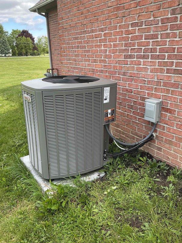 Completed MVP air conditioning tune-up on 2-year-old outdoor condensing unit. Performed comprehensive preventive maintenance inspection including visual assessment of compressor, electrical connections, and exterior components. Unit operating within normal parameters with proper voltage readings and secure wiring connections confirmed. All system components functioning as designed with no deficiencies noted.