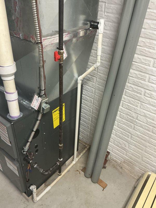 Completed MVP cooling maintenance visit on residential HVAC system. Inspected outdoor condenser unit and indoor furnace components, verified proper operation of cooling system, and documented equipment condition with photos. Made initial customer contact to establish service relationship for ongoing maintenance program.