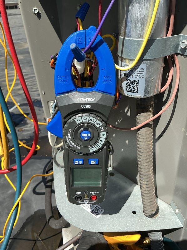 Completed comprehensive AC tune-up on 3-year-old rooftop unit, utilizing extended hose for condenser coil cleaning due to rooftop installation. Performed electrical diagnostics using clamp meter to verify proper amperage draw and system performance, inspected all electrical connections and refrigerant lines. Replaced furnace filter per customer request during service visit.