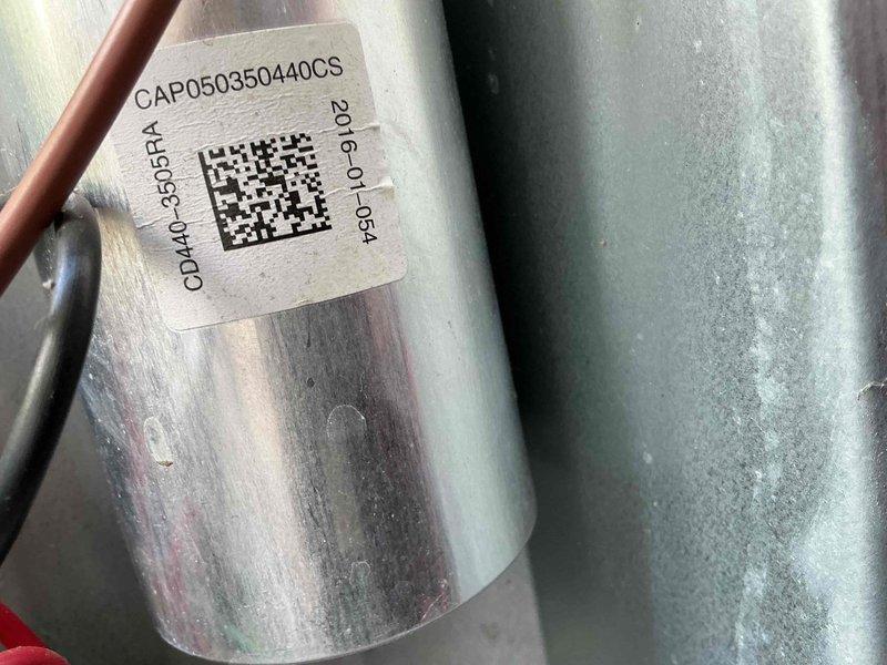 Responded to service call for furnace and exterior unit making noises. Upon arrival, inspected outdoor AC unit and found 2016 Goodman CDMQV-035RPA condenser with operational concerns. Opened access panel and performed electrical diagnostics on system components. Inspected capacitor (CAP050350440CS) for proper operation and checked all electrical connections including wiring to compressor and fan motor. Evaluated CoreSense Diagnostics module and verified wire connections including power, control, and sensor leads. Checked contactor, relay switches, and mounting hardware for secure installation. Documented equipment condition with photos showing capacitor specifications, wiring configuration, and diagnostic components. System evaluated for noise sources related to mechanical and electrical components. Customer advised of findings and potential plumbing leak requiring separate evaluation by qualified plumber, as this falls outside HVAC scope of work.