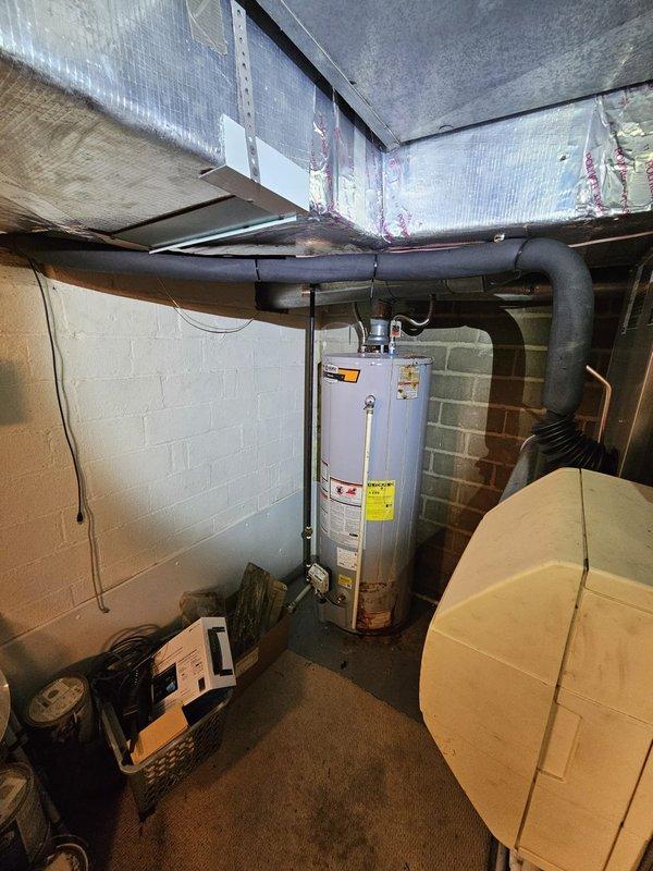 Completed installation of 14 SEER 4-ton air conditioning system with matching upflow cased coil in basement mechanical room. Removed existing humidifier and installed new 7/8" x 30' lineset, concrete equipment pad, electrical disconnect, and whip connection. Pulled new 8-conductor wire to existing thermostat location and configured system for proper operation. All components tested and verified functional upon completion.