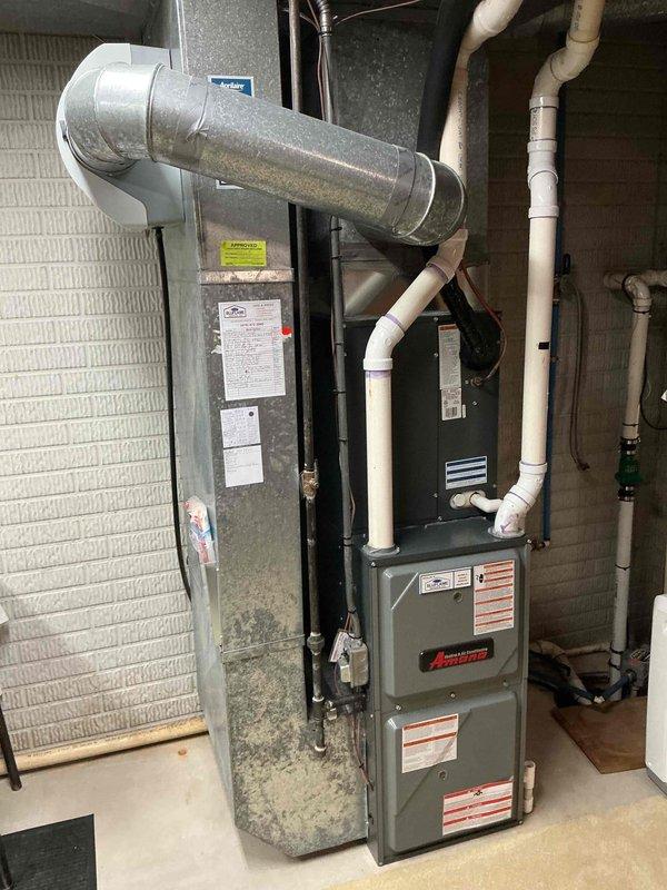 Completed preventive maintenance inspection on 12-year-old residential air conditioning system. Performed thorough examination of outdoor condensing unit, including electrical components, CareSaver surge protection device, capacitor, and all wiring connections. Inspected indoor Amana furnace unit and associated ductwork, verifying proper airflow and system integration. All components found operating within normal parameters, with no immediate repairs required at time of service.