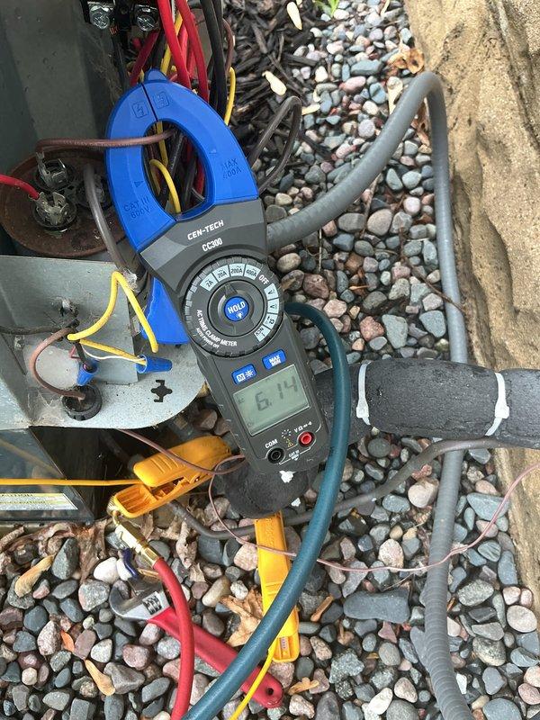 Completed routine cooling maintenance on aging air conditioning system over 10 years old. Performed electrical diagnostics using clamp meter, recording amperage draw of 6.7 amps, and measured supply air temperature at 48.7 degrees to verify proper system operation and cooling capacity.