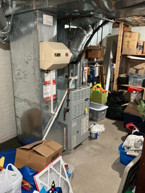 # HVAC Service Call - Air Conditioning System

Responded to service call for air conditioning system not producing cold air. Customer reported AC blower operating but no cooling output from 30-year-old outdoor unit.

Upon arrival, performed diagnostic assessment of aging air conditioning system. Conducted visual inspection of indoor air handler and outdoor condensing unit. Given the advanced age of the equipment (approximately 30 years old) and lack of cooling performance, evaluated system components for operational efficiency and potential failure points. Documented equipment condition through photographic records of mechanical room and HVAC installation.

Assessed overall system performance and provided customer with findings regarding the aging equipment's condition and cooling deficiency.