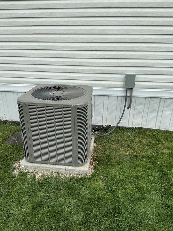 Completed full HVAC system replacement including installation of new 80% efficiency 70,000 BTU downflow furnace with coil cabinet and required supply duct connector. Installed new roof jack with flashing for furnace exhaust venting. Ran new 25-foot refrigerant line set connecting indoor and outdoor units. Set new Lennox 14 SEER single-stage condensing unit on concrete equipment pad with proper electrical disconnect and conduit installation. Reused existing thermostat to maintain customer preference and reduce costs. All components tested and verified operational upon completion.