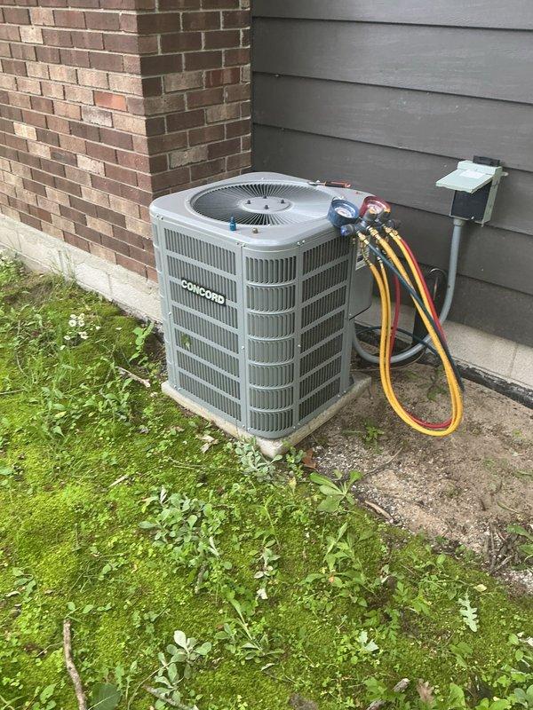 # A/C Performance Evaluation and Refrigerant Service

Responded to service call for inadequate cooling on 9-year-old residential air conditioning system. Connected manifold gauge set to condenser unit service ports to evaluate system pressures and diagnose cooling deficiency. Performed visual inspection of outdoor condenser unit, noting oxidation on copper refrigerant lines and verifying electrical disconnect box accessibility. Assessed suction and liquid line conditions at condensing unit location. Monitored refrigerant pressures to determine system performance and identify cause of reduced cooling capacity.