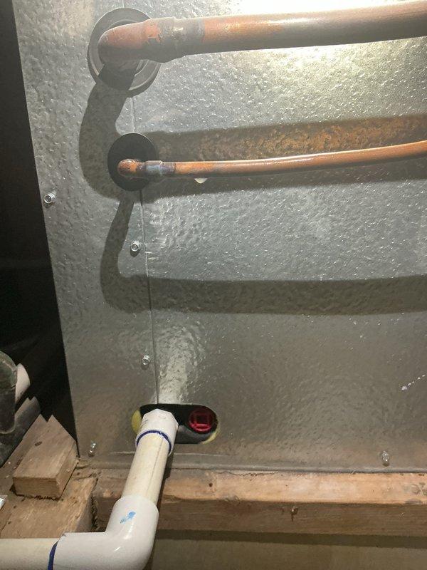 # A/C Performance Evaluation and Refrigerant Service

Responded to service call for inadequate cooling on 9-year-old residential air conditioning system. Connected manifold gauge set to condenser unit service ports to evaluate system pressures and diagnose cooling deficiency. Performed visual inspection of outdoor condenser unit, noting oxidation on copper refrigerant lines and verifying electrical disconnect box accessibility. Assessed suction and liquid line conditions at condensing unit location. Monitored refrigerant pressures to determine system performance and identify cause of reduced cooling capacity.